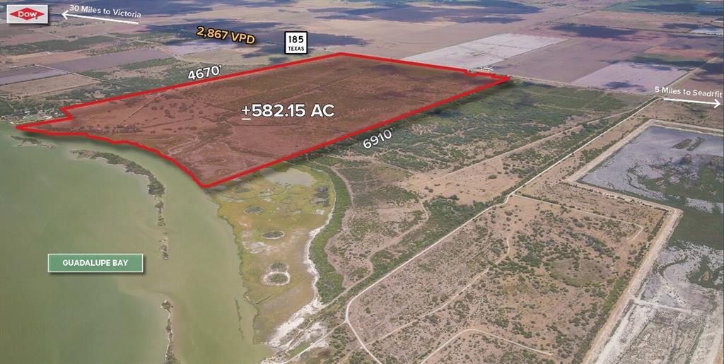 Ideal development site on Texas Coastal Bay on San Antonio Bay & Victoria Barge Canal, in Seadrift, across from Port O’Connor in Calhoun County. Suitable for Residential Development or Industrial plant (see concept photo). Seadrift is approximately 150mi from Houston, Austin & San Antonio, 1hr from Corpus Christi, 30mi to Rockport. With 4650ft of waterfront & 3500ft on State Hwy 185, site is easily accessible from major highways. Elevations up to 14ft MSL put houses on slabs – no need for piers. New Land Plan & renewal of some permits needed. A Municipal Utility District (MUD) has been formed, authorized to issue up to $84mil in bonds. A waterfront 3 bedroom, 2 bath, 2160sqft 2 story house, barns, cattle pens & fencing. Ag exemption, low property taxes. Property offers some of the best fishing the Texas Coast has to offer. Timing is perfect - Sell or Develop this property and be primed for sales when the Federal Reserve eases interest rates in 2024. 100% minerals owned & will convey.