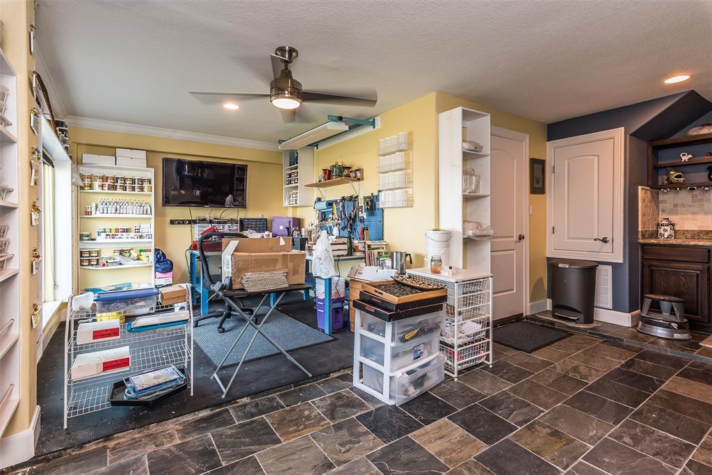 The second room in the studio comes complete with full sink area, tile flooring and a door to the other half of the studio -- so you can close and separate the rooms if you like.