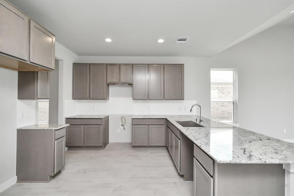 This generously spacious kitchen is a dream realized!