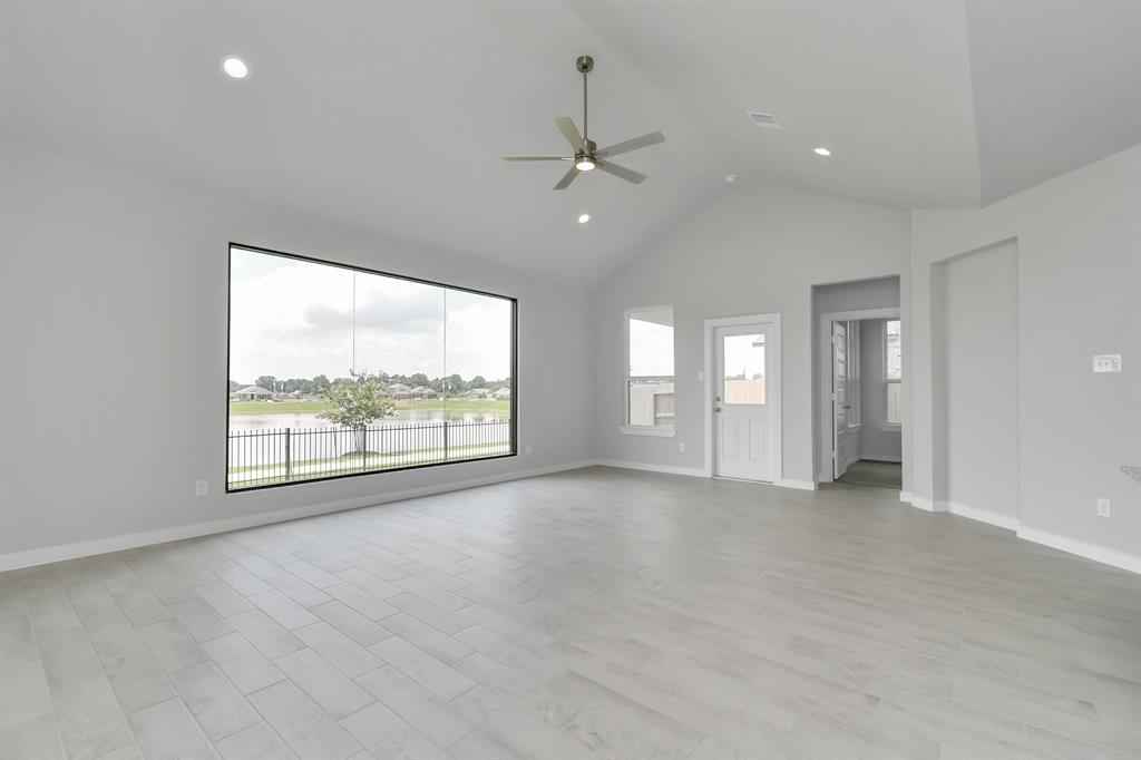 All of this overlooks your expansive family room, creating a perfect space for culinary delights and family gatherings.