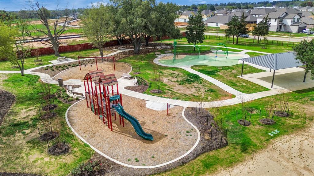 Immerse yourself in the vibrant spirit of the Oakwood community with this dedicated park area, featuring amenities for both kids and adults to enjoy. From playground adventures to serene relaxation spots, this lively space offers something for everyone, including a refreshing splash pad to beat the summer heat.