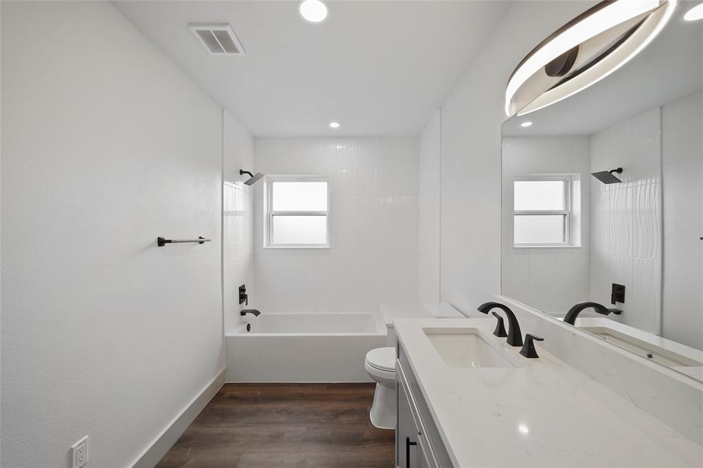 3rd full bathroom with tubs/shower combo.