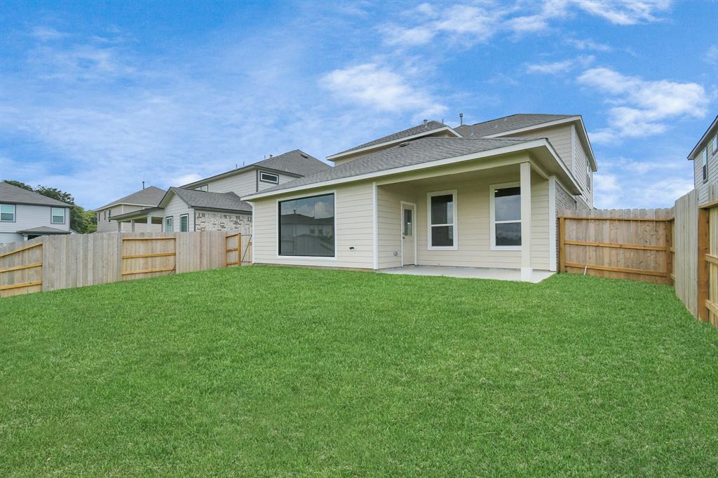 Explore the expansive backyard with its inviting covered patio—a perfect blend of space for the kids to play and adults to unwind. Ideal for creating your outdoor oasis, this backyard accommodates patio furniture, a BBQ pit, and endless possibilities for leisure and entertainment.