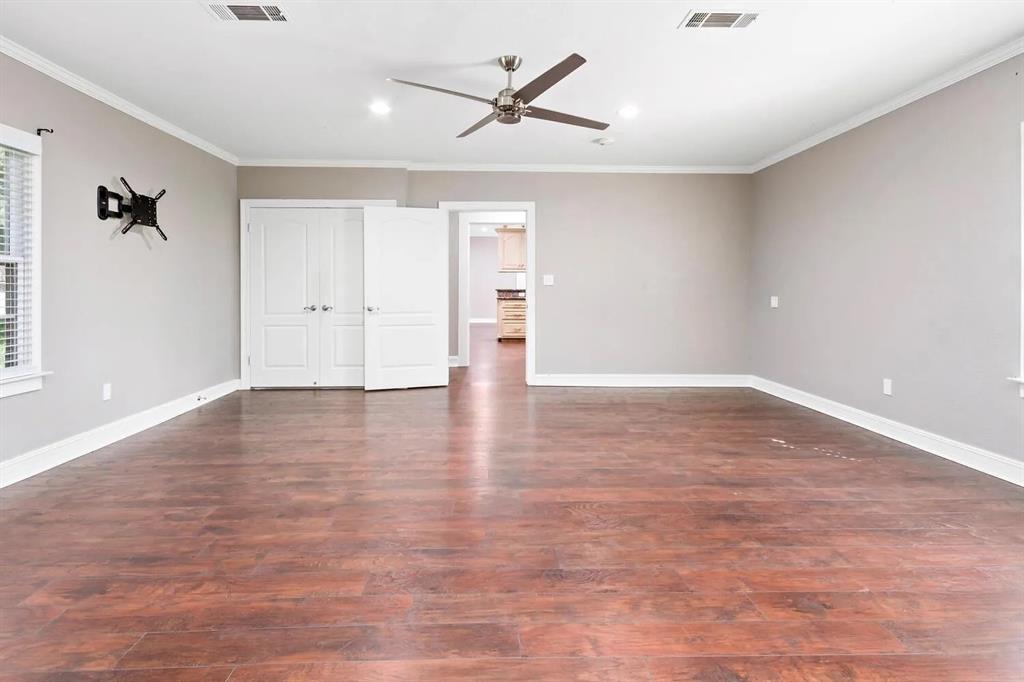 This room offers flexibility as it has been used as a second family room or a bedroom/office.