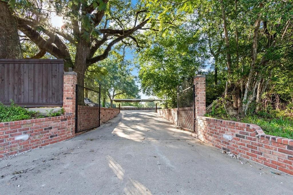 There is a secluded entrace with a gate coming in from the street.