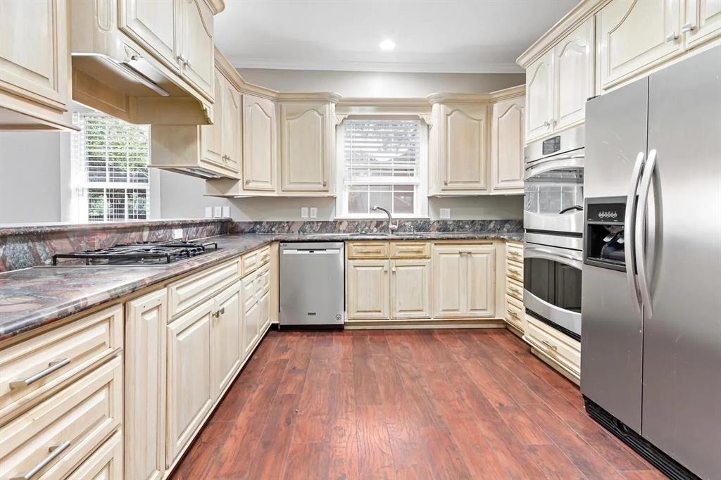 Remodeled kitchen with a gas cook top.