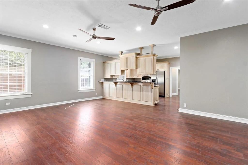 A open family room, off of the kitchen, allows for a seamless flow between two these two key rooms.