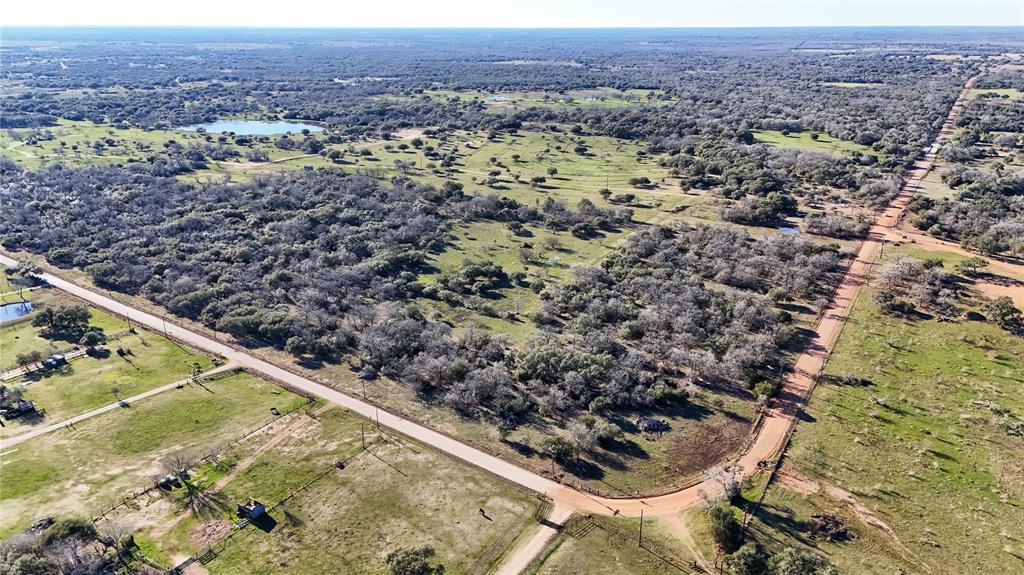 96.32 Acres Farm Ranch Property w/Gated Clearing perfect for a Custom Home**RARE:Unrestricted No Zoning**Located between Victoria & Yoakum TX . This beautiful natural wooded acreage & country retreat offers endless possibilities for Custom Built Estate Home w/ Electric & Well Water in place.
RV Canopy & Landscaped area offers a quiet retreat. Sport enthusiasts will appreciate the natural wildlife including Deer, Turkeys, Doves, Quail, & more. Natural hard & soft wood trees Recent new fencing.**Award Winning Medical Facilities Close By**Recreation in the area offers Country Clubs, Golf, Famous Shiner Brewery & Local Wineries. Just a short drive to the Gulf Coast for Beaches & Fishing including Rockport, Matagorda Island & Port Lavaca. A 20 minute drive to Victoria TX and less than 2 hours from major Texas cities like Houston, San Antonio, Corpus Christi & Austin. See MLS# 42611731 (tract 2) & 31635251(tract 5) other tracts for sale. Existing grazing leases for cattle.