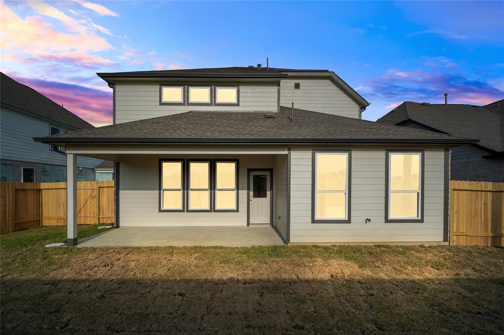 Come and see this spacious backyard with its beautiful covered patio. There is plenty of room for the kids to play and adults to relax! Perfect for your outdoor living space, patio furniture, bbq pit, and so much more. The possibilities are endless!