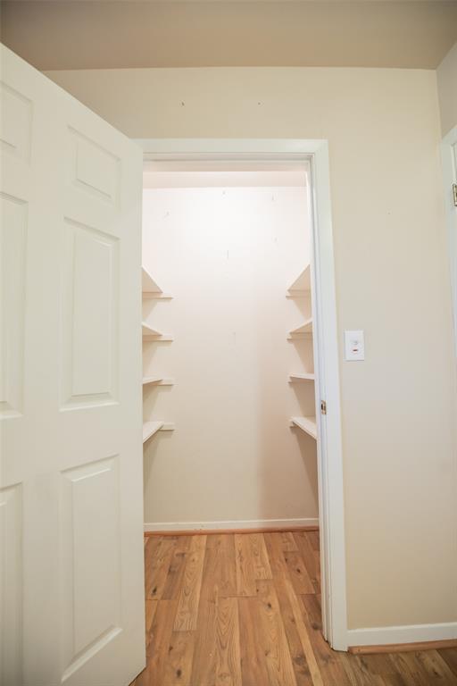 Large walk-in storage closet or extra pantry.