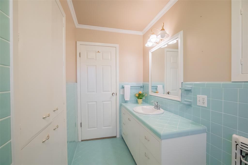 Linen cabinets to the left for toiletries and towels. NOTE all of the doors have been upgraded to 6 panel doors.