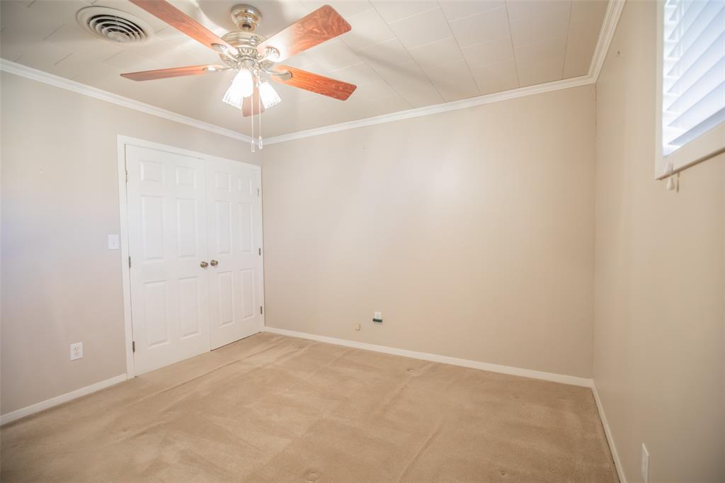 Bedroom 2 - Carpet, ceiling fan, double door closet, crown molding, 2\