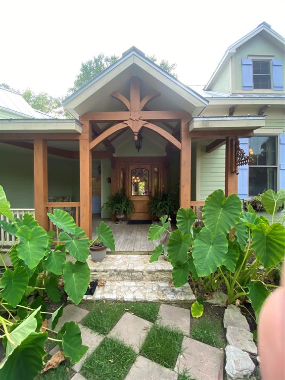 Blended historic home and custom built addition with a Texas style English manor feel