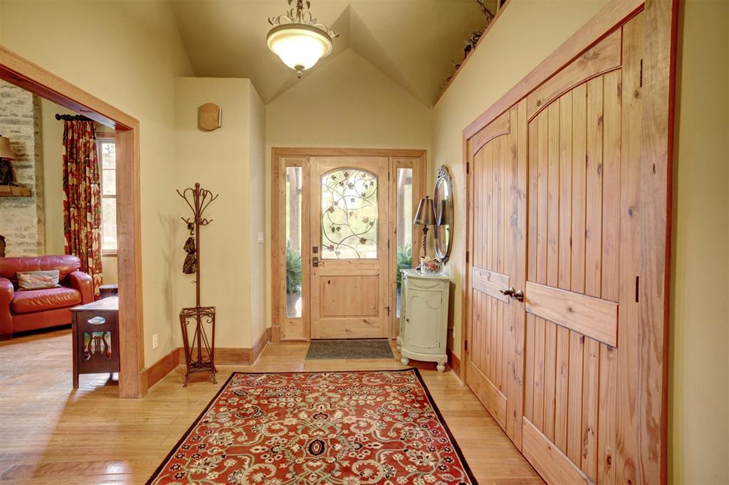 Expansive living space with cathedral beamed ceilings