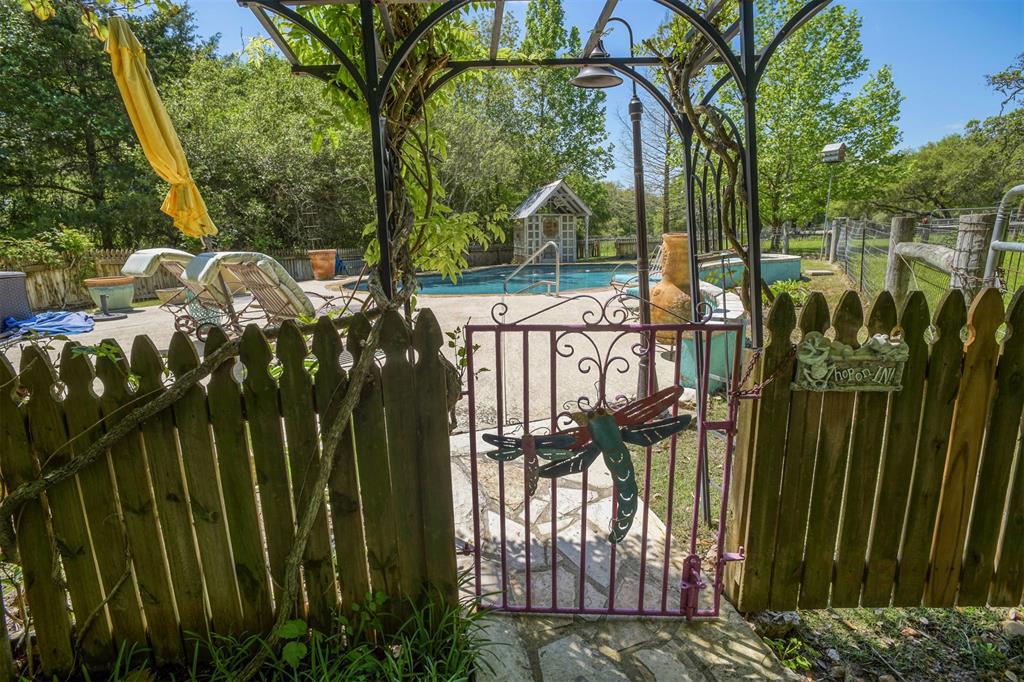 Pool has ample cool decking around it for sunning and relaxing