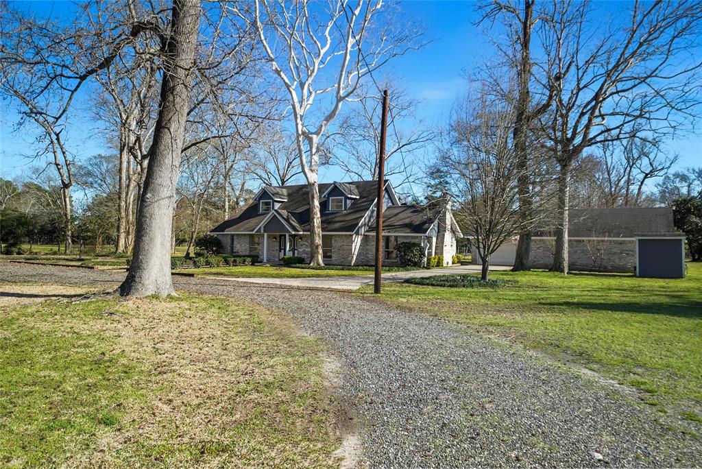 Circle Driveway + Detached 2+ car Garage with abundance of storage