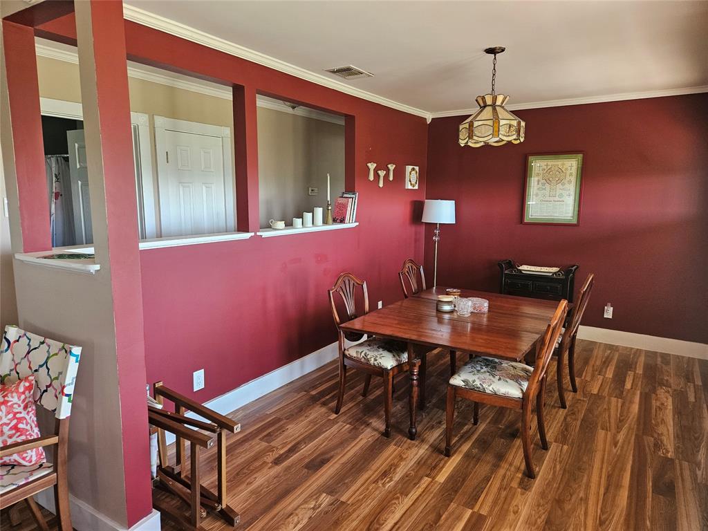 Spacious dining room will accommodate plenty of seating or could become an office or craft room.