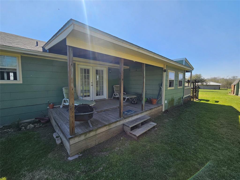 View of the French doors opening onto the back porch.