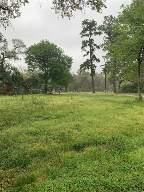 4 acres in Northwest Houston, build your dream home in this family neighborhood, cleared, backs up to White Oak Bayou. Selling at land value only, has electric, septic, and gas.  Will require a water well. Includes outbuilding 12 x 20 with workbenches, and another outbuilding 12 x 15. Short distance to 290 and 249, restaurants and grocery stores.