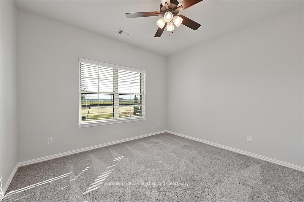 This photo is of a finished home with the same floorplan. Finishes and colors may vary.