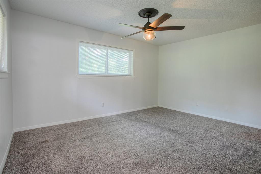 Bedroom # 3 freshly. painted and new carpet June 2024