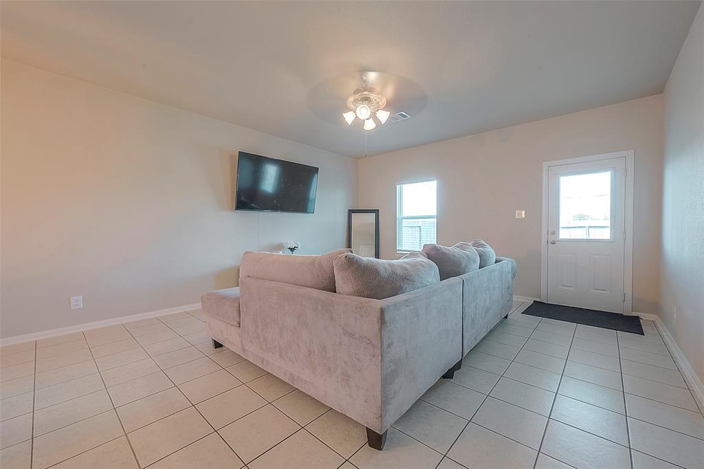 This lovely living room is a great space to gather and visit with your friends and family or enjoy a quiet, peaceful evening at home with your favorite person.