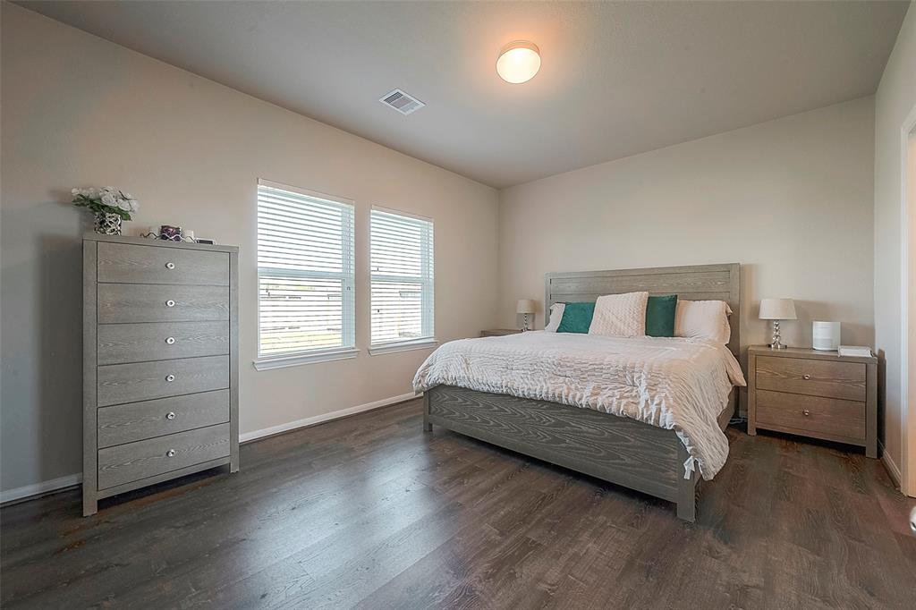 Spacious primary bedroom is directly connected to the primary bathroom including a large walk-in closet. The room has endless potential, perfect for creating space for relaxation and personal style.