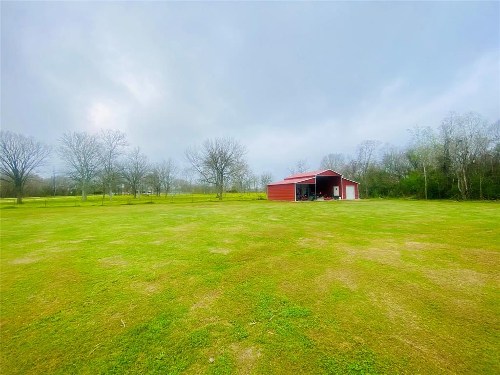 This 1.5 acre corner lot has a beautiful red bard ready for your tools, toys, and more!  Utilities are ready for your new home with city water, septic system, and electricity.  Country living on a quiet cul-de-sac street close to all of the city amenities.