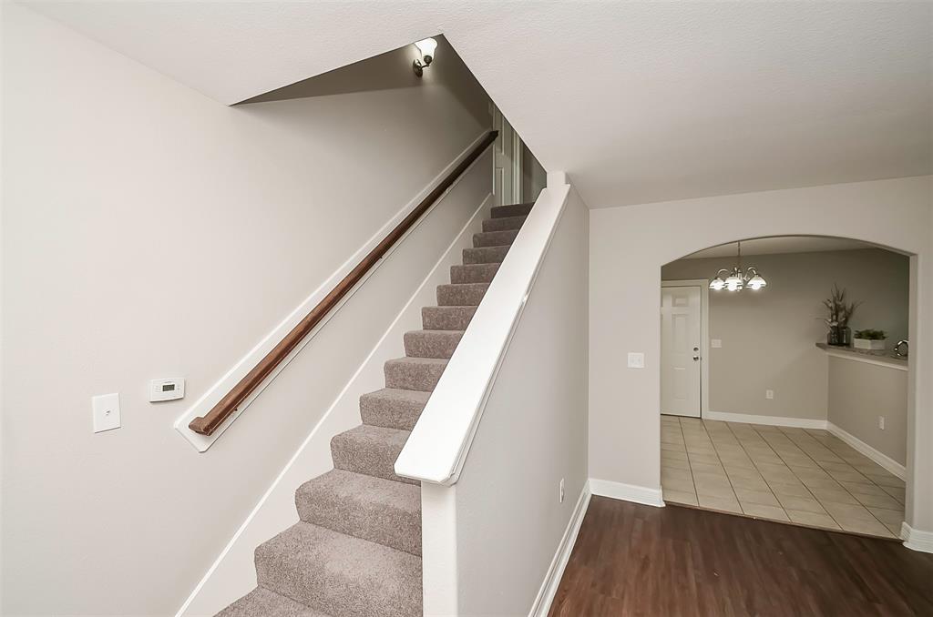 Primary bathroom includes an ADA shower and dual closets.