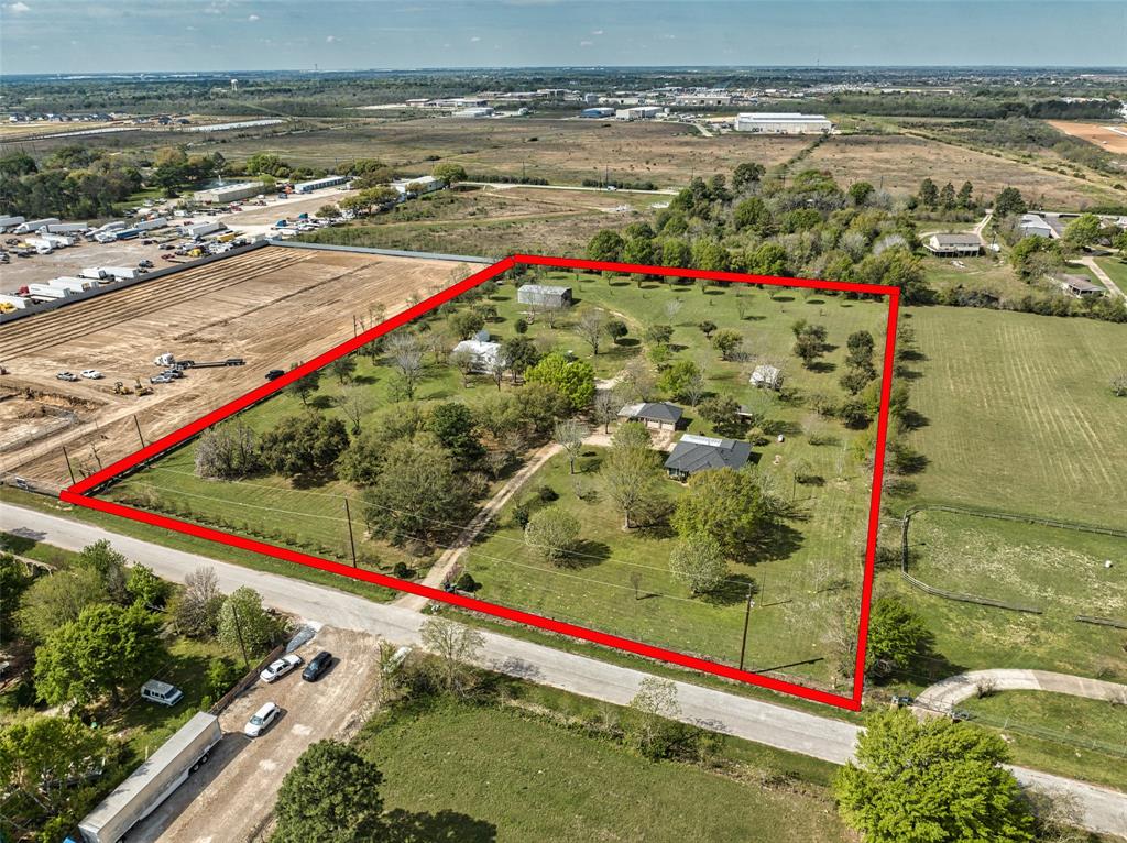 This property is 6.78 UNRESTRICTED acres in a prime location. This is an ideal area for a COMMERCIAL development. It is located near the corner of Katy Hockley Cut-Off and Clay Rd, just minutes from the Grand Parkway. There are plans underway to widen Clay to a 4-lane road at the Roland Rd intersection. It currently has 2 residences, either of which could be converted into an office if needed. It is not in the flood plain.