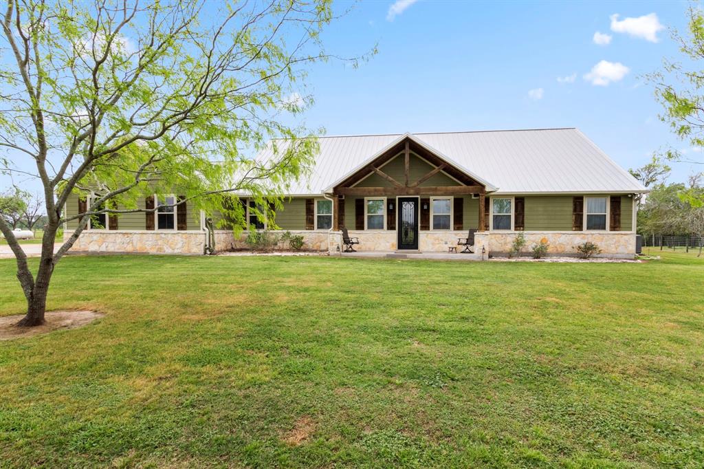 10 sprawling acres of unrestricted land in East Bernard with just 5 minutes from town and EBISD! Drive down your tree-lined driveway into your private gated property. This 8 year old custom home features 4 bedrooms, 3 full bathrooms 1 half bath, an office, and a game room. One of the secondary bedrooms that shares a jack and jill bath, has high ceilings and a loft/play area! The oversized primary bedroom has room for a sitting area/workout space with large windows to enjoy while overlooking your pool! With his and hers walk-in closets and tons of storage this home has all the features you are looking for and more. Call today for your private tour!!