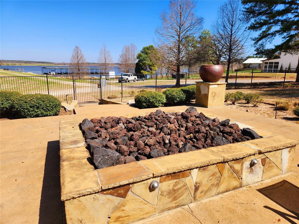 Imagine hosting your guest around the is enormous fire pit next to the community pool