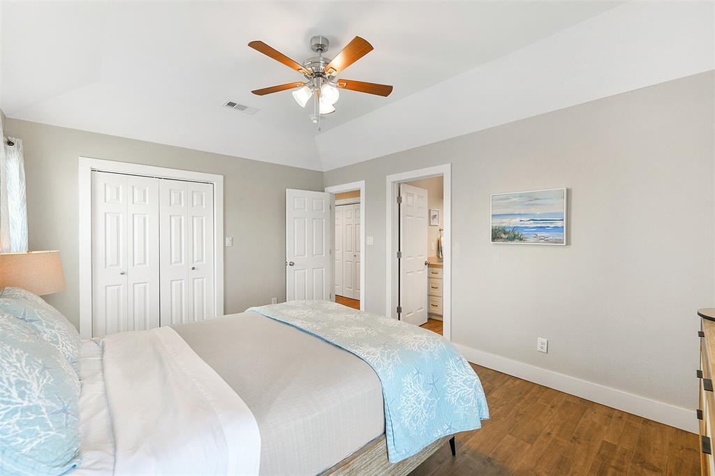 The primary bedroom is light and bright! You have access to your own private deck.