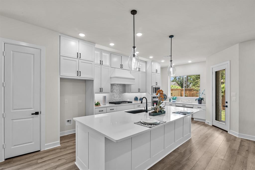 EXAMPLE PHOTO: Large Kitchen w/built in desk at rear of home!