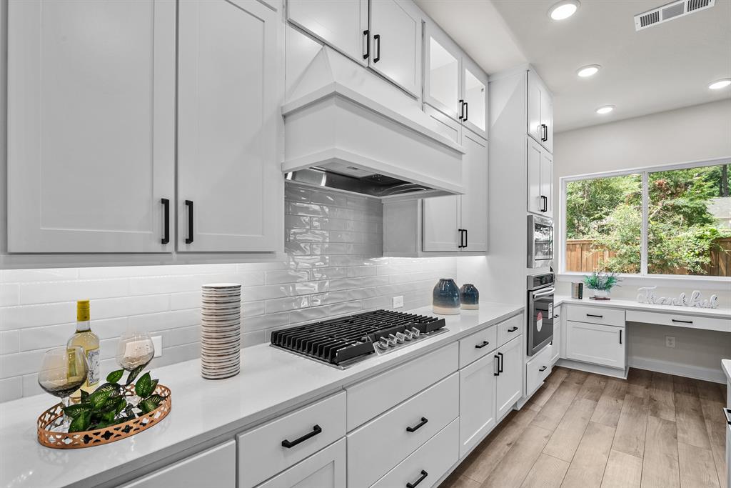 EXAMPLE PHOTO: Built in cabinets at Dining area!