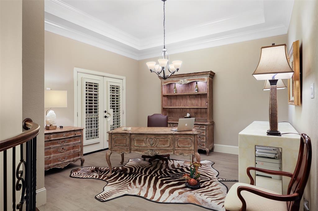 Dining room / study has doors that lead to the front balcony.