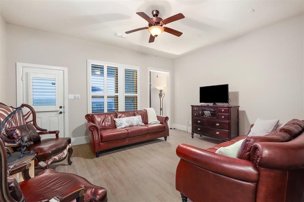 Game room with water views.  In the back corner is the entrance to the elevator.