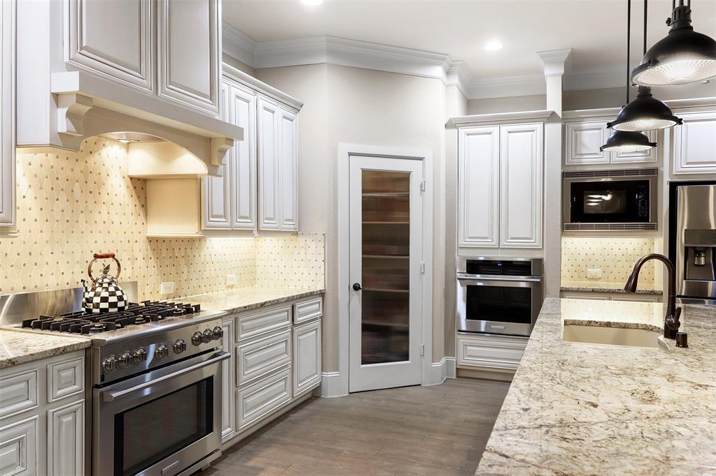 Six burner cooktop and a convection oven.