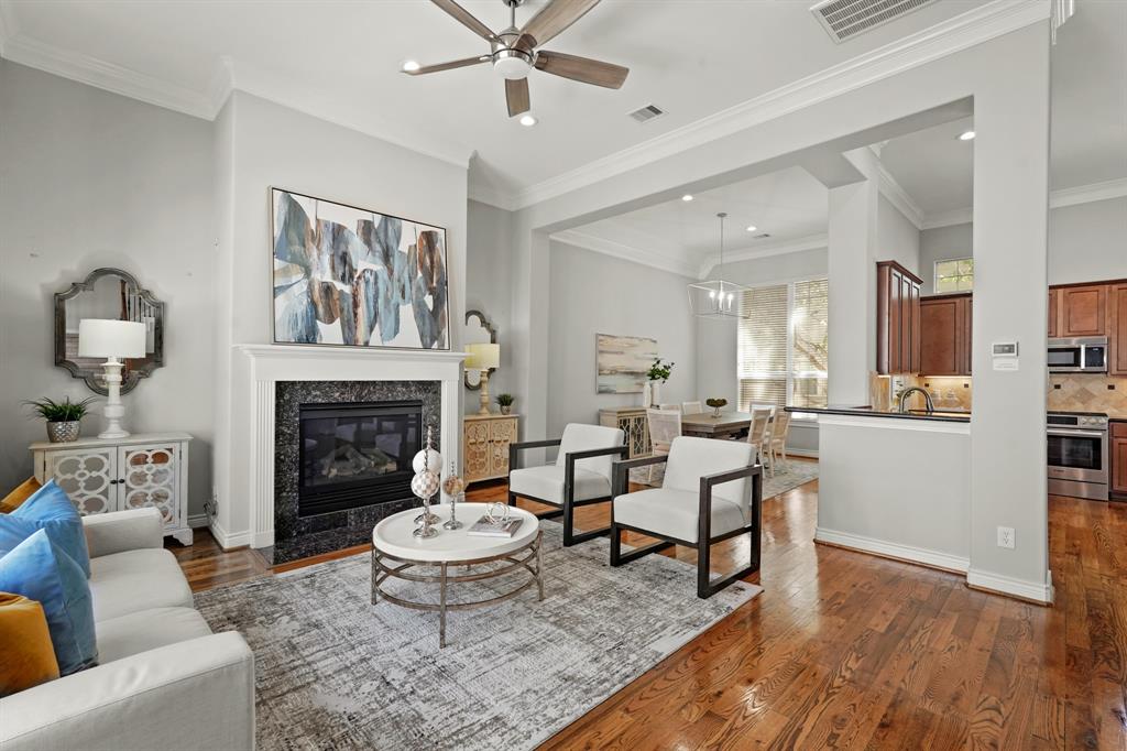 The living room opens up to the kitchen and dining room