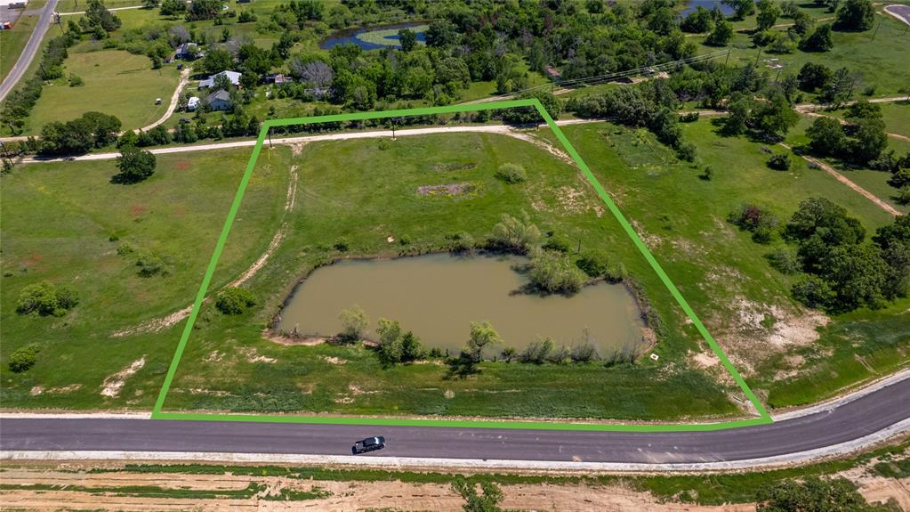 The newest subdivision in Burleson County, Brazos River Reserve, is an acreage development located between Caldwell and Bryan/College Station just south of State Highway 21. Breathtaking views of the river bottom as well as mature trees are on every lot, making the subdivision highly desirable being a short 10 minutes from Bryan. Lot sizes range from 1.39 acres to 18.63 acres and are lightly restricted with a 1,800 square foot minimum on homes and barndominiums are allowed. Septic is required. This lot is equipped with a pond along with a water well.