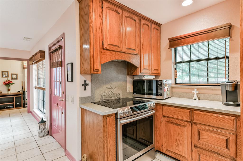 All kitchen cabinets are custom made with pull out shelves