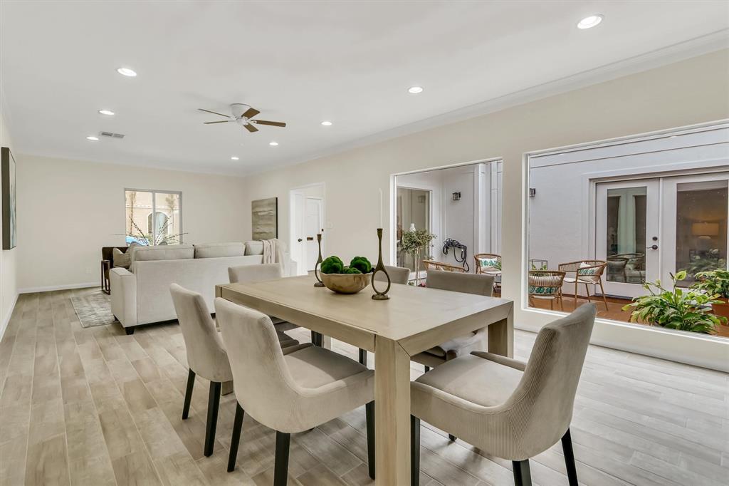 Dining room & Living room with the view of the court yard, abundance of natural light.