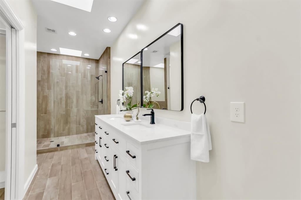 2nd primary bathroom.Double sink, Spacious Walking Closet.