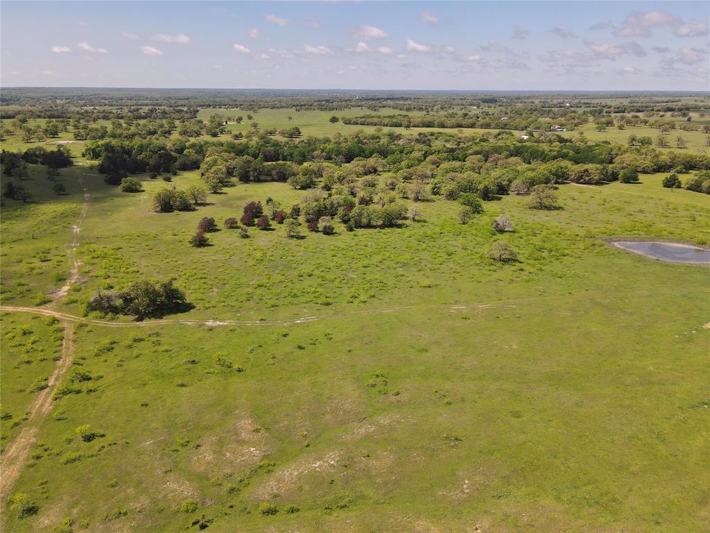 Beautiful 108+ Acre property located 8 miles north of Giddings on CR 120. Mainly open pasture land w/ scattered mature trees, more heavily wooded in the back, and nice views of the countryside. Property has a 2,000 sq. ft. metal barn w/ concrete slab, Bluebonnet Electric & Lee County Water is on the property & 2 water wells. It is fenced and cross-fenced with 3 ponds and lots of wildlife for hunting. There is an old house on the the property that can be renovated or torn down. Ag Exemption currently used for cattle grazing. Located in the heart of Central Texas so come enjoy the quiet country setting in Lee County.