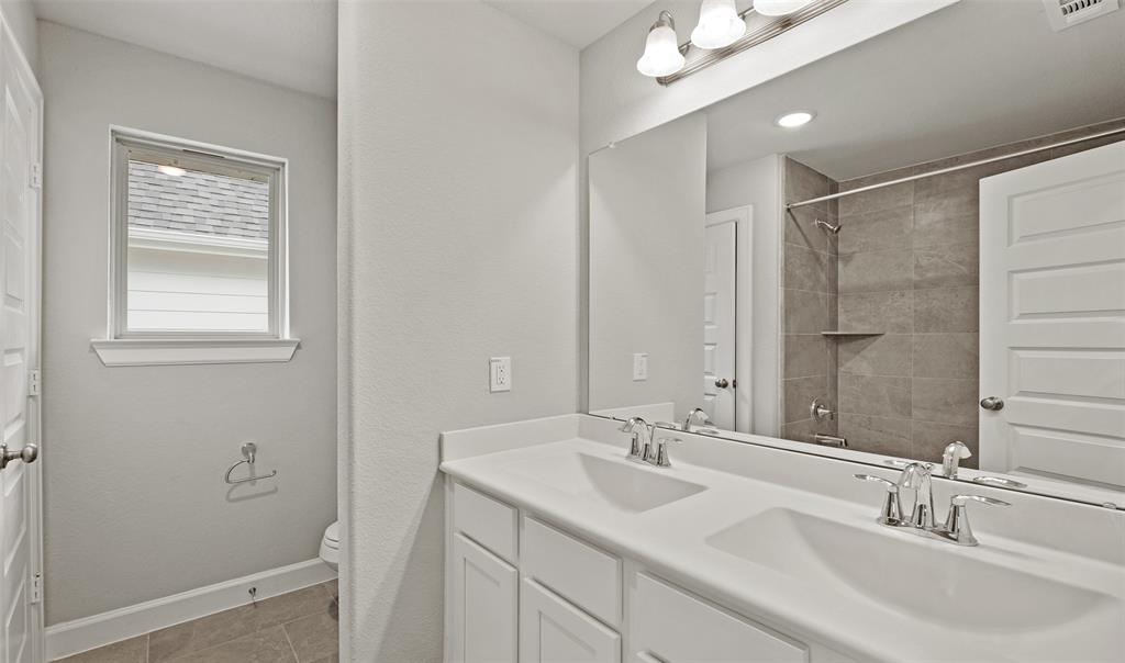 Double sinks in hall bath (*Photo not of actual home and used for illustration purposes only.)