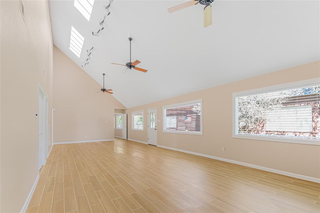 Grand Living Room with skylights for natural lighting