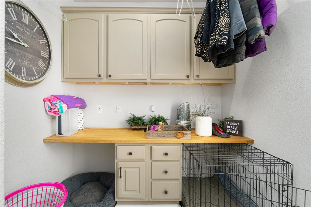 Counter space, storage in the study/laundry room