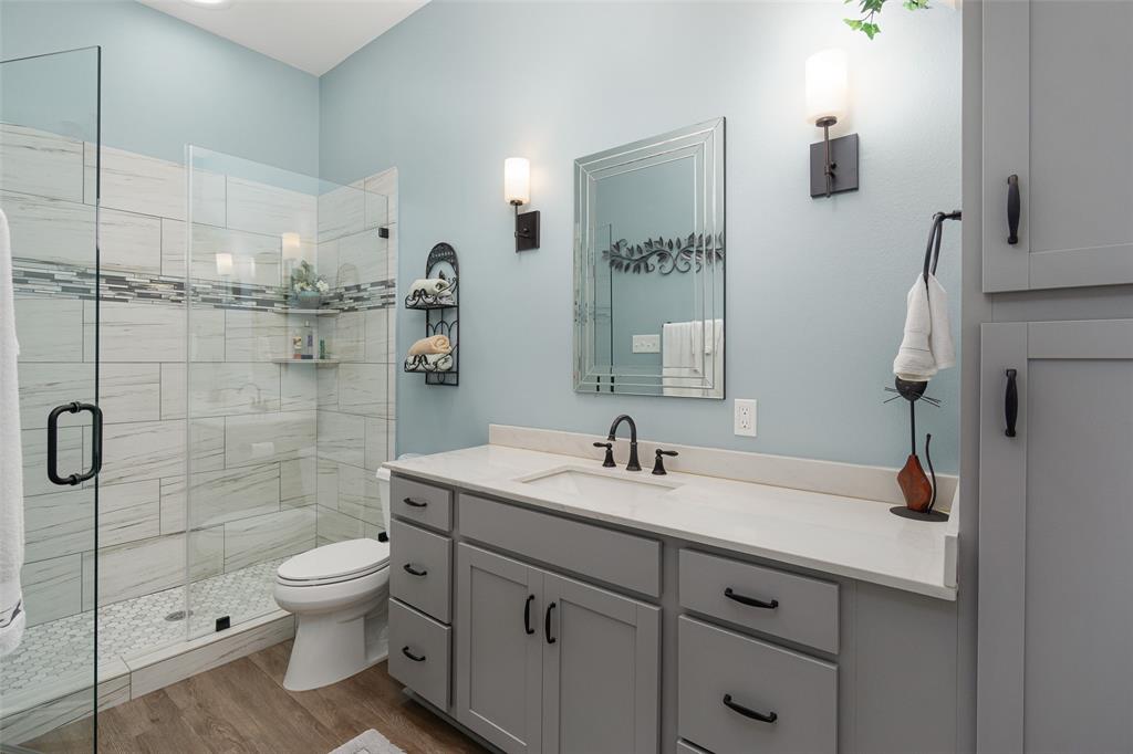 Full bath with fully tiled walk in shower