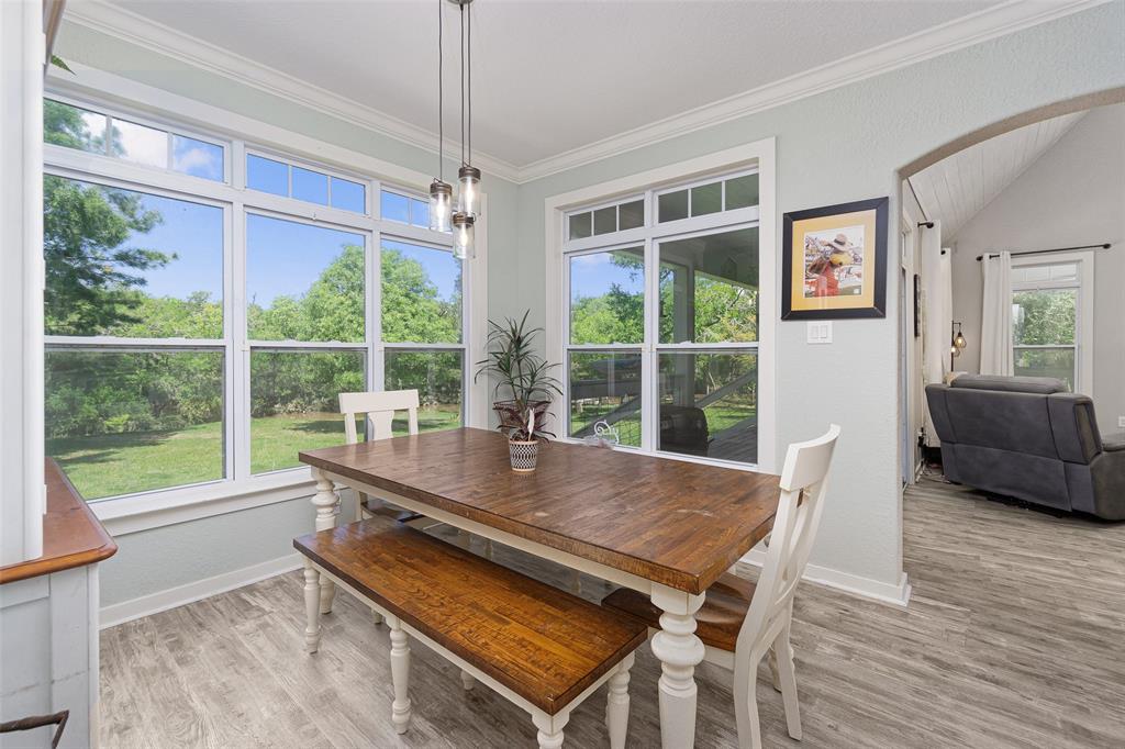 Breakfast space surrounded by windows. Water view!