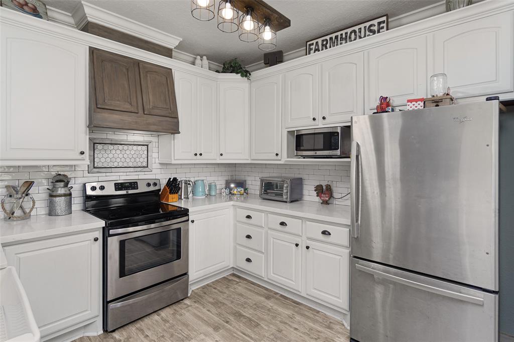 Farmhouse kitchen- stainless steel appliances